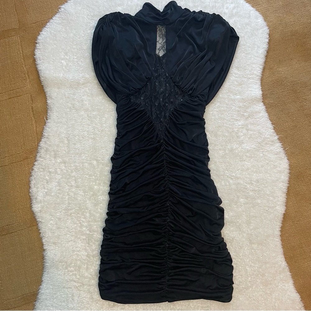 Filigree bodycon silky ruched black midi cocktail dress with lace panel and cape